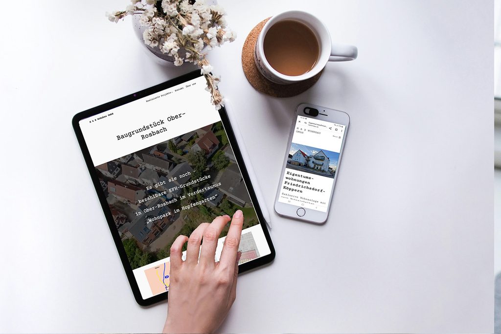 Bild von laptop und Smartphone mit Referenz Website www.hbwohnbau.de von Content Managerin Ulrike Bernhard